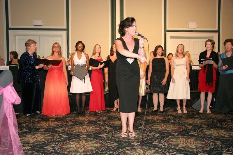 Mary Helen Griffis Singing at Convention Carnation Banquet Photograph 6, July 15, 2006 (Image)