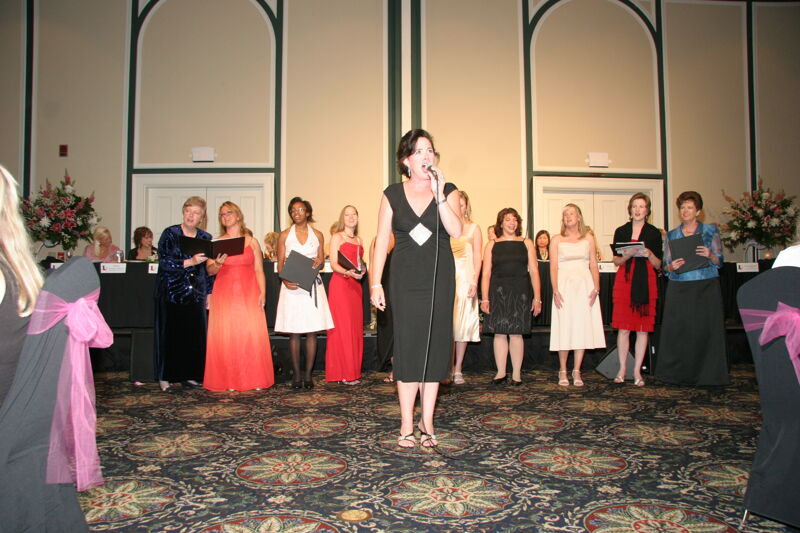 Mary Helen Griffis Singing at Convention Carnation Banquet Photograph 7, July 15, 2006 (Image)