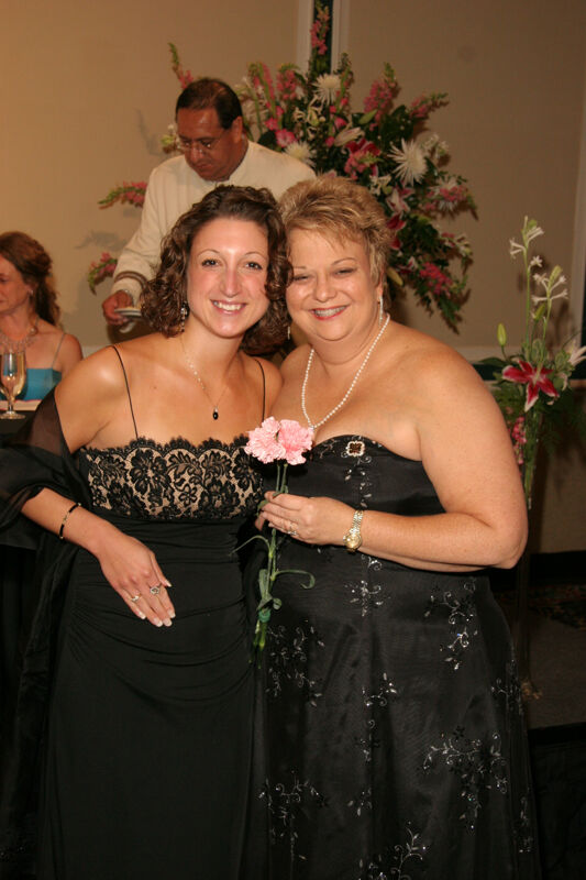 Kathy Williams and Unidentified With Flower at Convention Carnation Banquet Photograph, July 15, 2006 (Image)