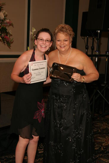 Kathy Williams and Gamma Gamma Chapter Member With Award at Convention Carnation Banquet Photograph, July 15, 2006 (image)