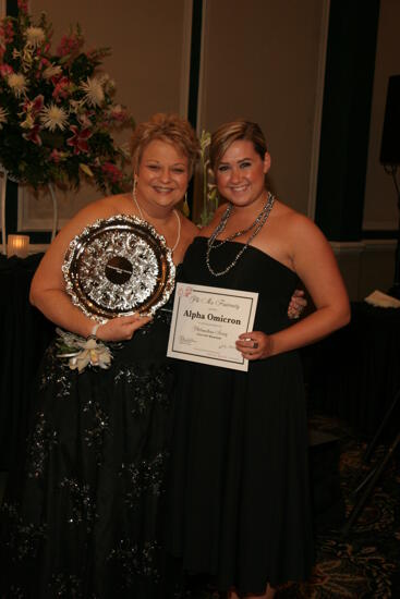 Kathy Williams and Alpha Omicron Chapter Member With Award at Convention Carnation Banquet Photograph, July 15, 2006 (image)