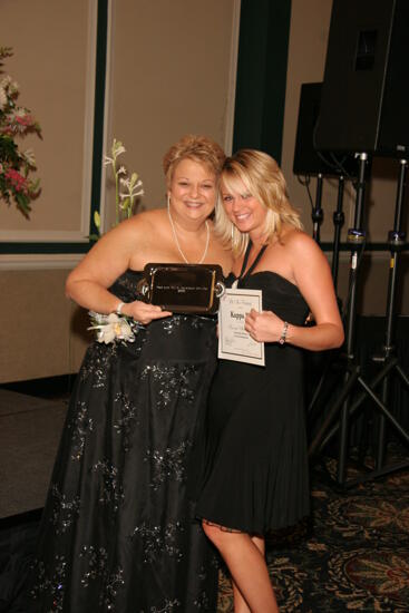 Kathy Williams and Kappa Xi Chapter Member With Award at Convention Carnation Banquet Photograph, July 15, 2006 (image)