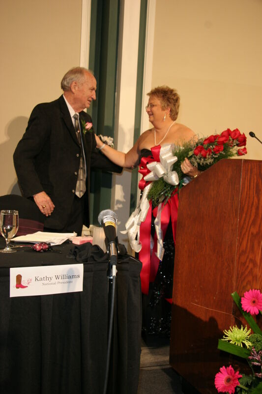 July 15 Kathy Williams Receiving Flowers at Convention Carnation Banquet Photograph 2 Image