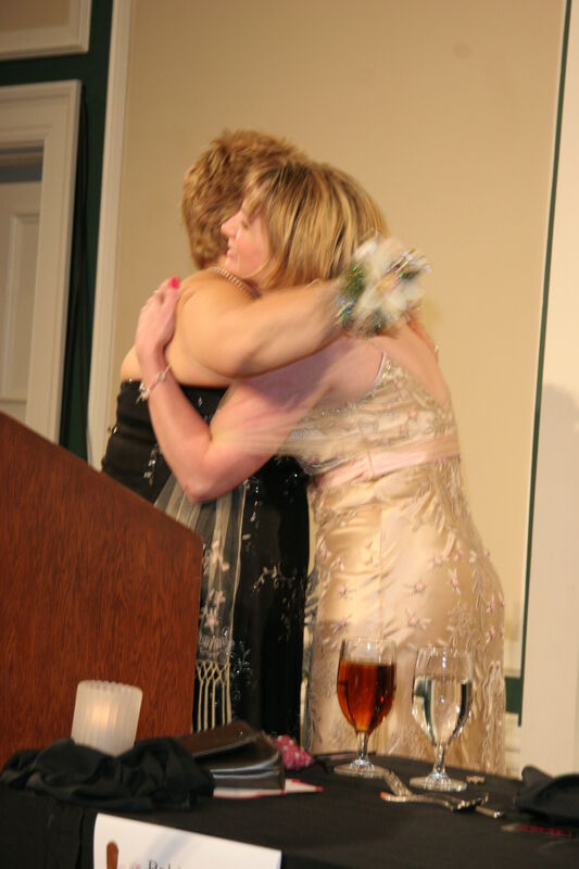 July 15 Kathy Williams Hugging Robin Fanning at Convention Carnation Banquet Photograph Image