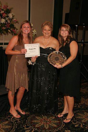 Kathy Williams and Kappa Phi Chapter Members With Award at Convention Carnation Banquet Photograph, July 15, 2006 (image)