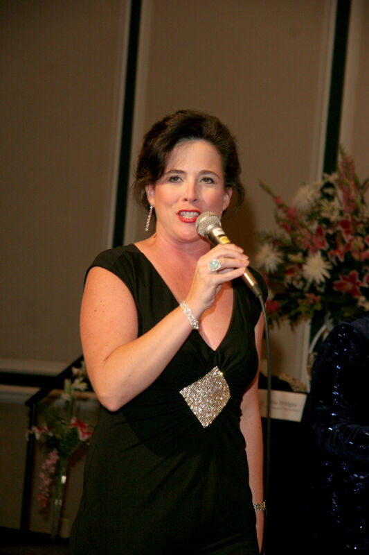 Mary Helen Griffis Singing at Convention Carnation Banquet Photograph 1, July 15, 2006 (Image)