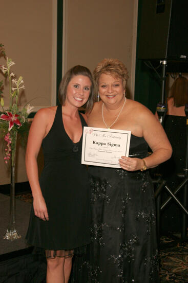 Kathy Williams and Kappa Sigma Chapter Member With Certificate at Convention Carnation Banquet Photograph, July 15, 2006 (image)