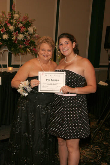 Kathy Williams and Phi Kappa Chapter Member With Certificate at Convention Carnation Banquet Photograph, July 15, 2006 (image)