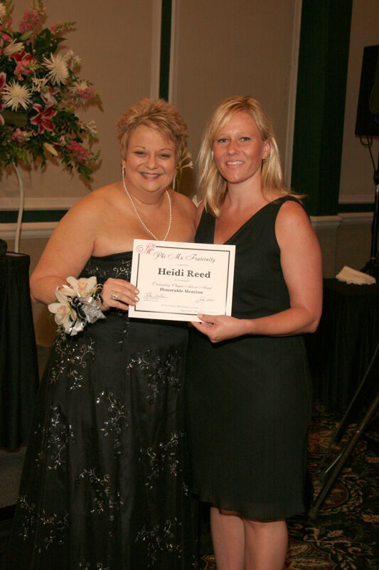 Kathy Williams and Heidi Reed With Certificate at Convention Carnation Banquet Photograph, July 15, 2006 (Image)