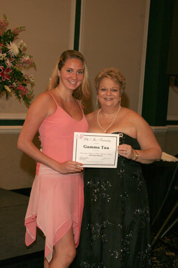 Kathy Williams and Gamma Tau Chapter Member With Certificate at Convention Carnation Banquet Photograph, July 15, 2006 (image)