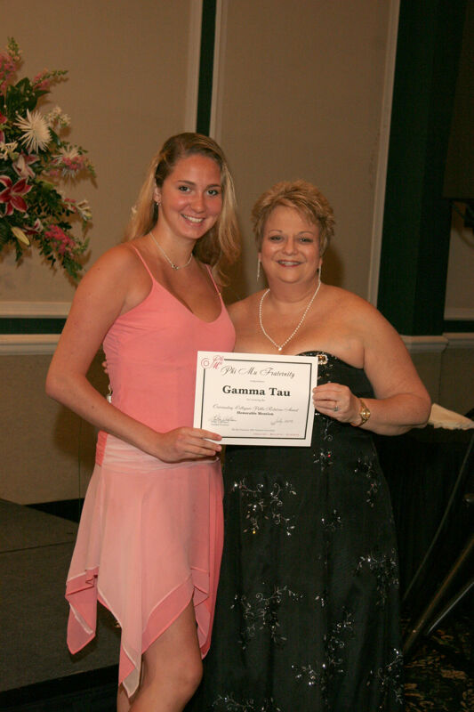 July 15 Kathy Williams and Gamma Tau Chapter Member With Certificate at Convention Carnation Banquet Photograph Image