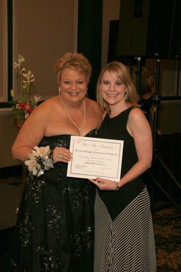 Kathy Williams and Baton Rouge Alumna With Certificate at Convention Carnation Banquet Photograph, July 15, 2006 (image)