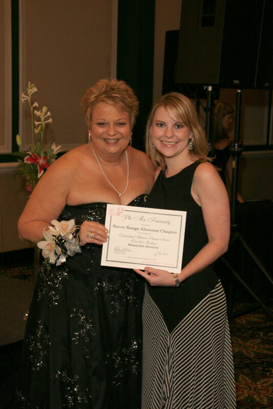 Kathy Williams and Baton Rouge Alumna With Certificate at Convention Carnation Banquet Photograph, July 15, 2006 (Image)