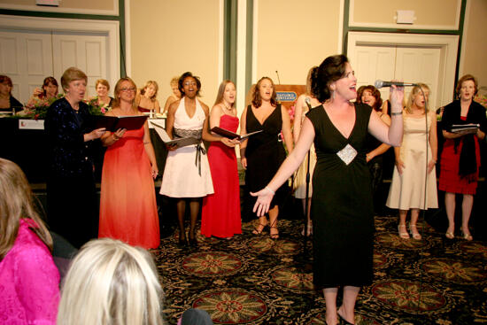 Mary Helen Griffis Singing at Convention Carnation Banquet Photograph 4, July 15, 2006 (image)