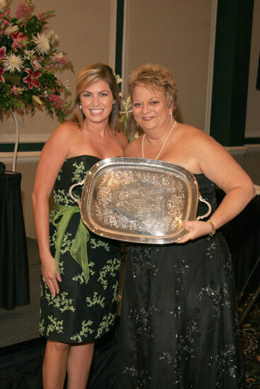 Kathy Williams and Unidentified With Award at Convention Carnation Banquet Photograph 4, July 15, 2006 (image)