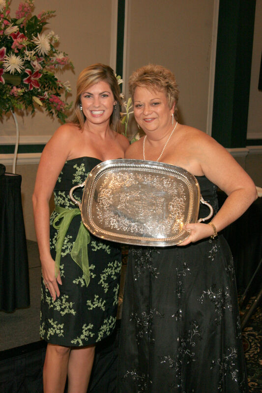Kathy Williams and Unidentified With Award at Convention Carnation Banquet Photograph 4, July 15, 2006 (Image)