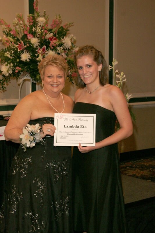 July 15 Kathy Williams and Lambda Eta Chapter Member With Certificate at Convention Carnation Banquet Photograph Image