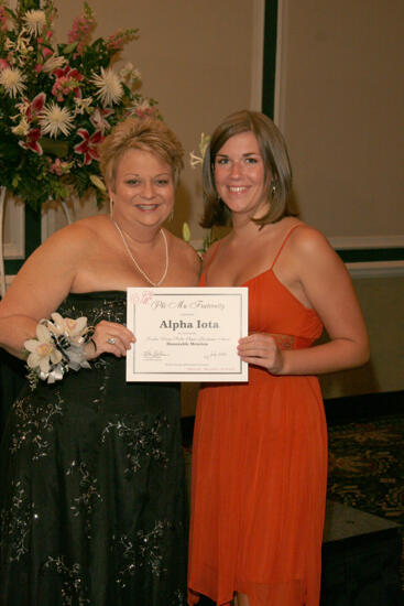 Kathy Williams and Alpha Iota Chapter Member With Certificate at Convention Carnation Banquet Photograph, July 15, 2006 (image)