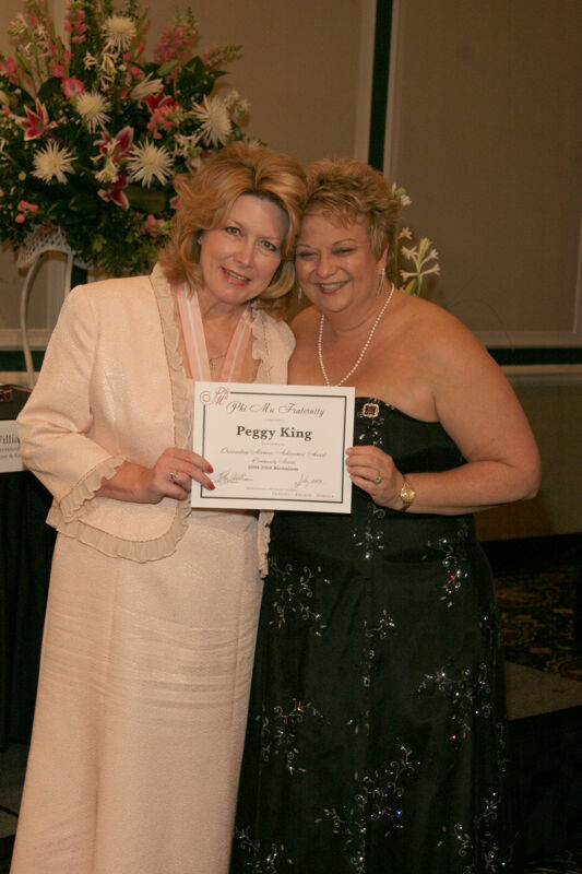 Kathy Williams and Peggy King With Award at Convention Carnation Banquet Photograph, July 15, 2006 (Image)