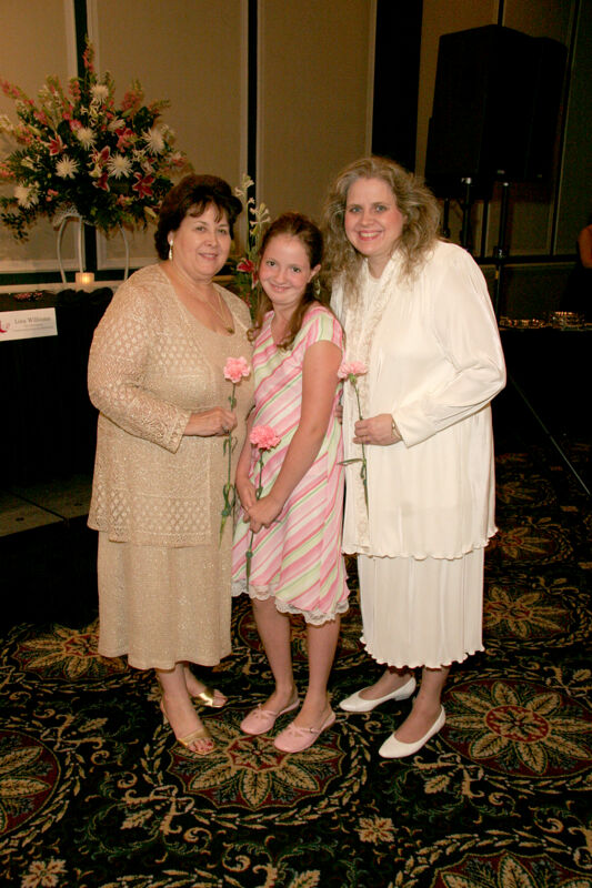 Mary Jane Johnson and Family at Convention Carnation Banquet Photograph, July 15, 2006 (Image)