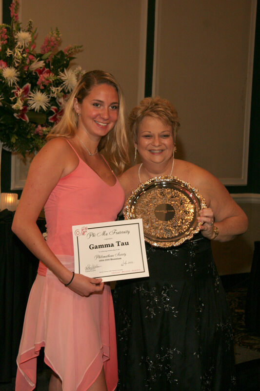 Kathy Williams and Gamma Tau Chapter Member With Award at Convention Carnation Banquet Photograph 2, July 15, 2006 (Image)