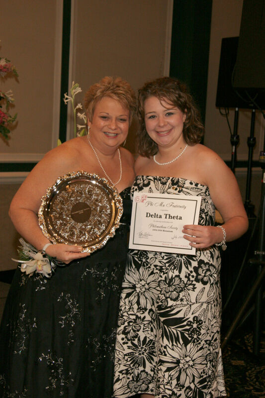 Kathy Williams and Delta Theta Chapter Member With Award at Convention Carnation Banquet Photograph, July 15, 2006 (Image)