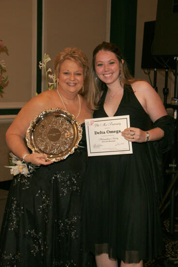 Kathy Williams and Delta Omega Chapter Member With Award at Convention Carnation Banquet Photograph, July 15, 2006 (image)