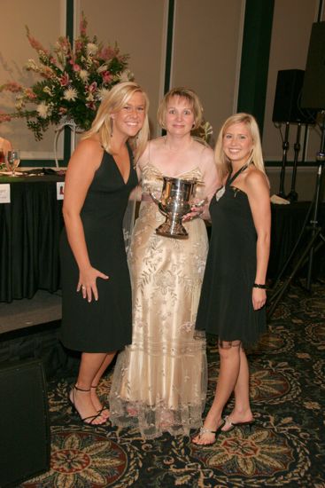 Robin Fanning and Two Phi Mus With Award at Convention Carnation Banquet Photograph, July 15, 2006 (image)