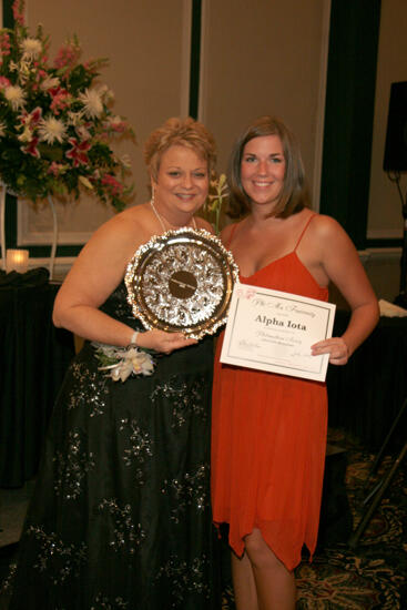 Kathy Williams and Alpha Iota Chapter Member With Award at Convention Carnation Banquet Photograph, July 15, 2006 (image)