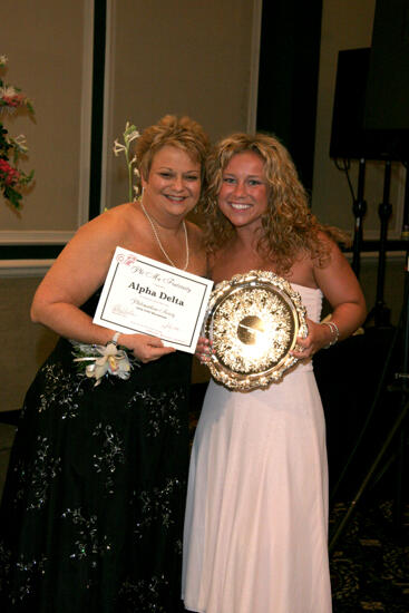 Kathy Williams and Alpha Delta Chapter Member With Award at Convention Carnation Banquet Photograph, July 15, 2006 (image)