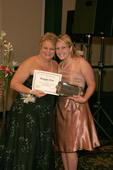 Kathy Williams and Kappa Eta Chapter Member With Award at Convention Carnation Banquet Photograph, July 15, 2006 (image)