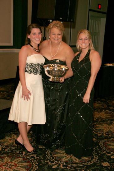 Kathy Williams and Two Unidentified Phi Mus With Award at Convention Carnation Banquet Photograph, July 15, 2006 (image)