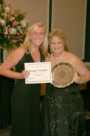 Kathy Williams and Kappa Lambda Chapter Member With Award at Convention Carnation Banquet Photograph, July 15, 2006 (image)