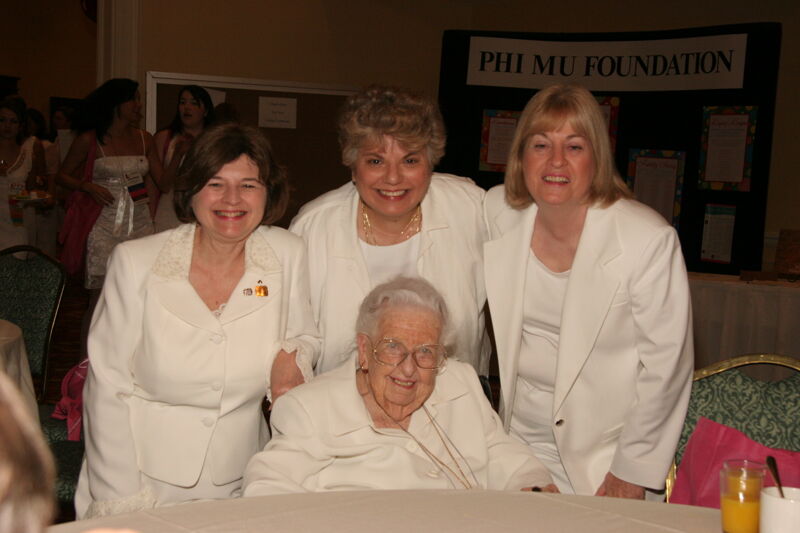 Leona Hughes and Three Unidentified Phi Mus at Saturday Convention Breakfast Photograph 2, July 15, 2006 (Image)