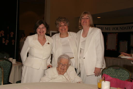 Leona Hughes and Three Unidentified Phi Mus at Saturday Convention Breakfast Photograph 1, July 15, 2006 (image)