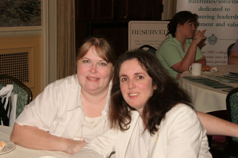 Two Unidentified Phi Mus at Saturday Convention Breakfast Photograph, July 15, 2006 (Image)