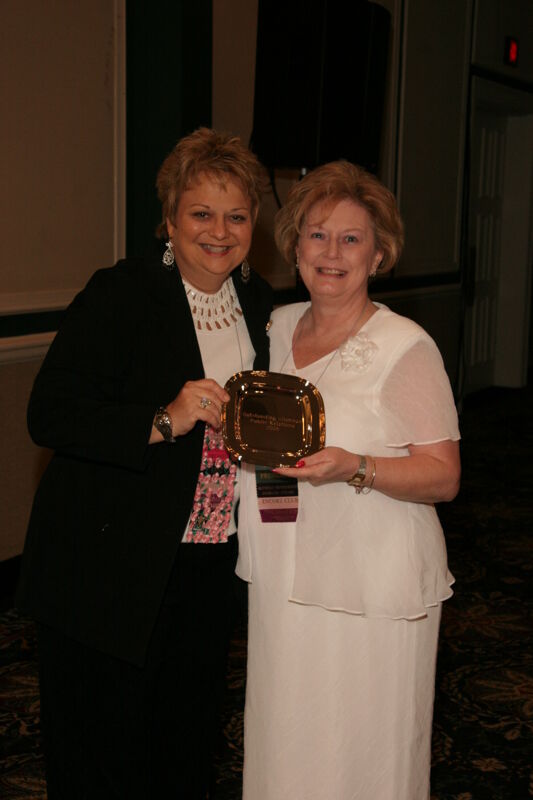 Kathy Williams and Unidentified With Award at Convention Sisterhood Luncheon Photograph 2, July 15, 2006 (Image)