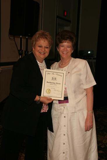 Kathy Williams and Katherine Flynt With Certificate at Convention Sisterhood Luncheon Photograph, July 15, 2006 (image)