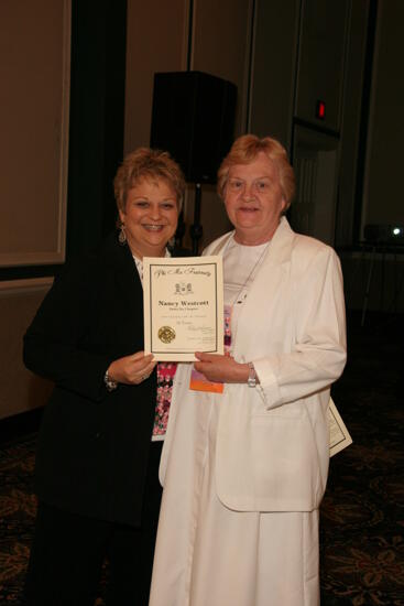 Kathy Williams and Nancy Westcott With Certificate at Convention Sisterhood Luncheon Photograph, July 15, 2006 (image)