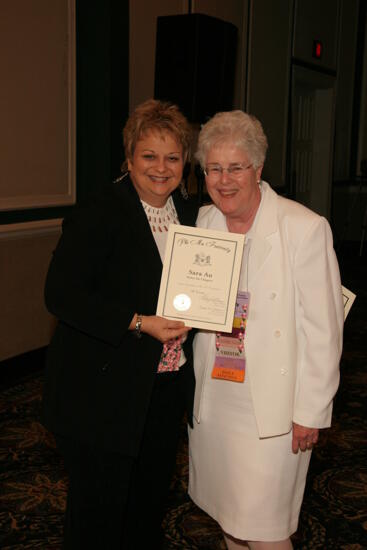 Kathy Williams and Sara Au With Certificate at Convention Sisterhood Luncheon Photograph, July 15, 2006 (image)