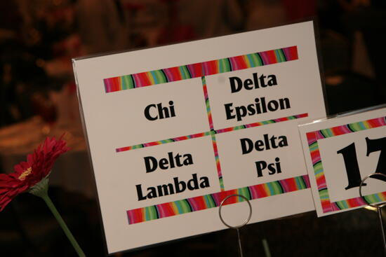 Chi, Delta Epsilon, Delta Lambda, and Delta Psi Chapters Sign at Convention Sisterhood Luncheon Photograph, July 15, 2006 (image)