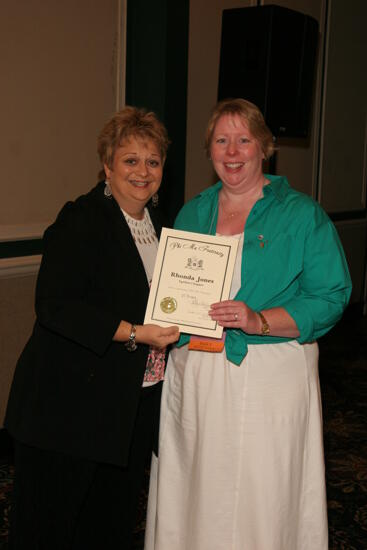 Kathy Williams and Rhonda Jones With Certificate at Convention Sisterhood Luncheon Photograph, July 15, 2006 (image)