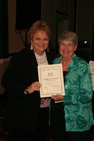 Kathy Williams and Ulrike Goodwin With Certificate at Convention Sisterhood Luncheon Photograph 2, July 15, 2006 (image)