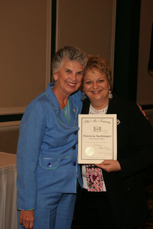 Kathy Williams and Patricia Sackinger With Certificate at Convention Sisterhood Luncheon Photograph, July 15, 2006 (Image)