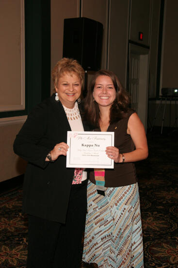 Kathy Williams and Kappa Nu Chapter Member With Certificate at Convention Sisterhood Luncheon Photograph 2, July 15, 2006 (image)