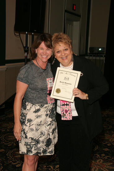 Kathy Williams and Beth Monnin With Certificate at Convention Sisterhood Luncheon Photograph, July 15, 2006 (image)