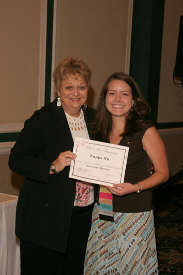 Kathy Williams and Kappa Nu Chapter Member With Certificate at Convention Sisterhood Luncheon Photograph 1, July 15, 2006 (image)