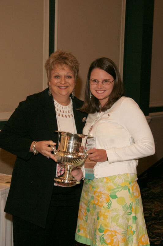 Kathy Williams and Jessica Layson With Award at Convention Sisterhood Luncheon Photograph 1, July 15, 2006 (Image)