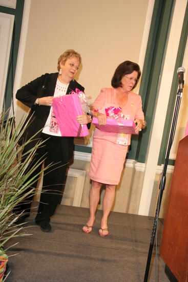 Shellye McCarty and Kathy Williams With Gifts at Convention Sisterhood Luncheon Photograph 3, July 15, 2006 (image)