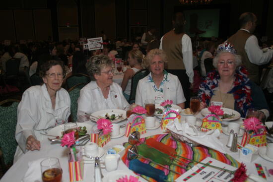 Phillips, Unidentified, Jackson, and Nemir at Convention Sisterhood Luncheon Photograph 1, July 15, 2006 (image)